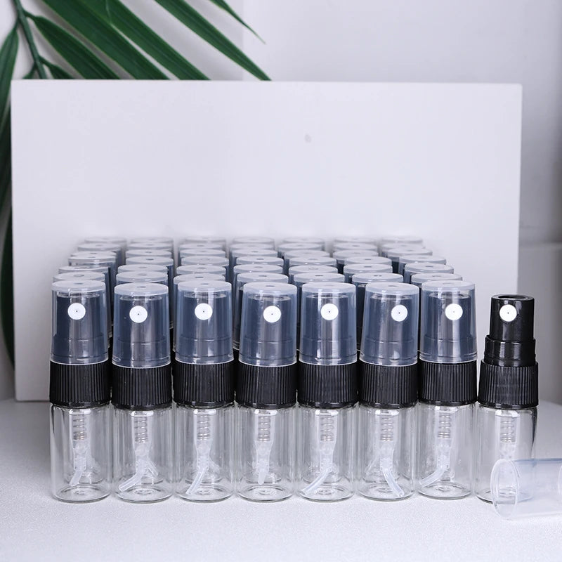 Hot sale 50/piece 2ml transparent glass perfume bottle disposable trial bottle mini travel portable cologne perfume bottle