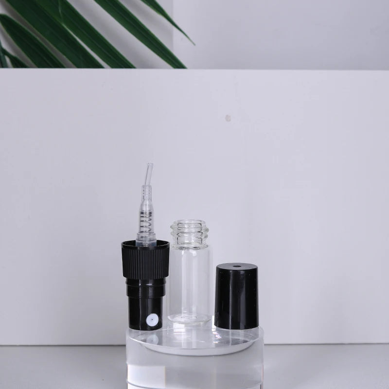 Hot sale 50/piece 2ml transparent glass perfume bottle disposable trial bottle mini travel portable cologne perfume bottle