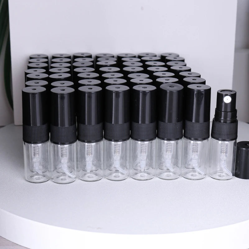 Hot sale 50/piece 2ml transparent glass perfume bottle disposable trial bottle mini travel portable cologne perfume bottle